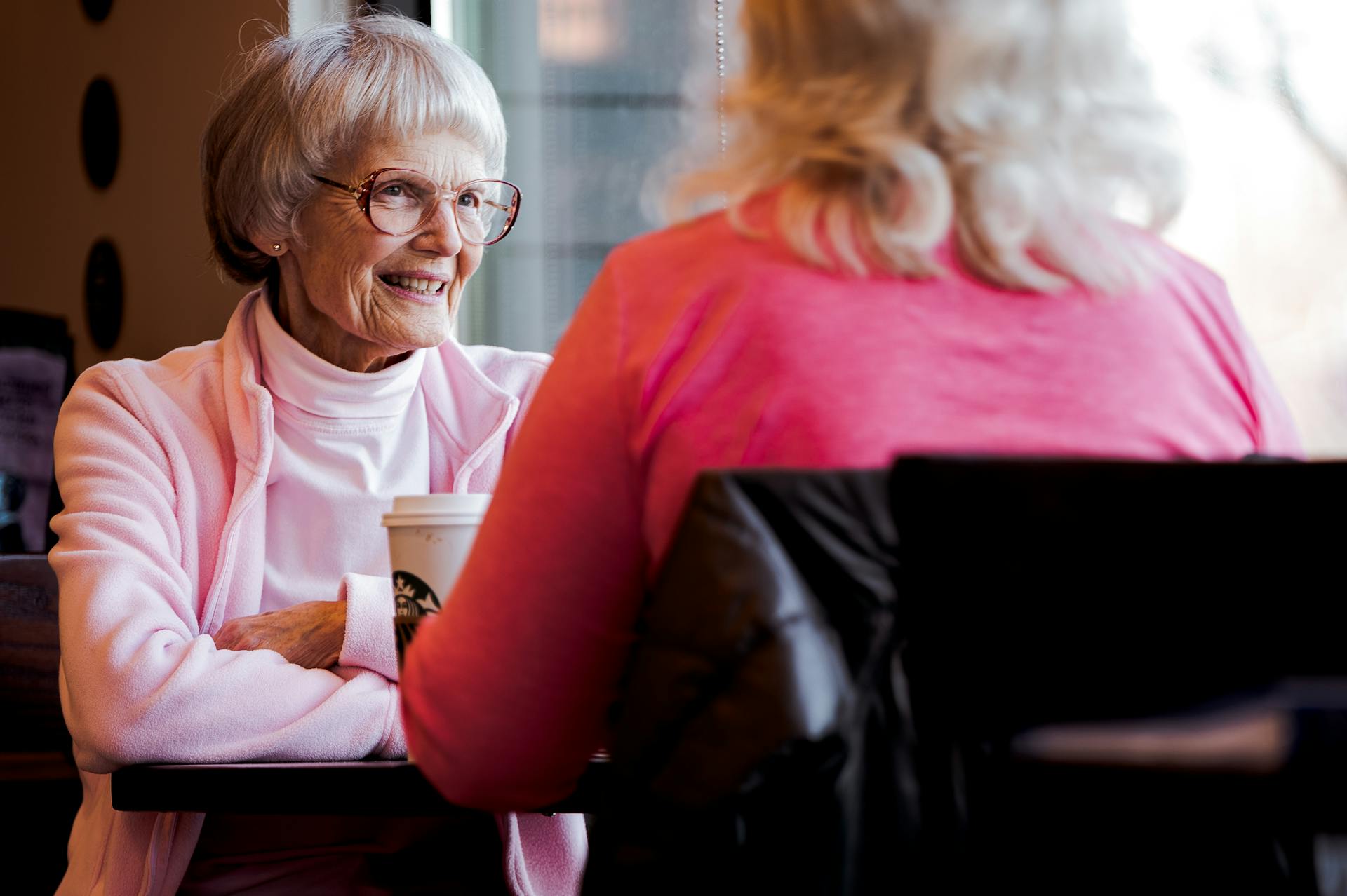 assisted living poway a senior having coffee with her daughter